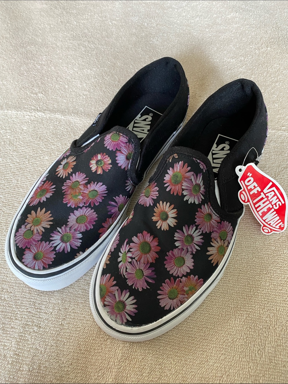 Vans Black Slip-On Sneakers with Pink Daisy Print